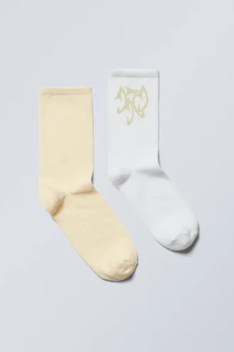 2er-Pack weiche Socken mit Print – Gelb & Weiß