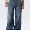 Astro Mid Rise Loose Baggy Unisex-Jeans – Blue Hymn – Mittelblau Astro Mid Rise Loose Baggy Unisex-Jeans – Blue Hymn – Mittelblau