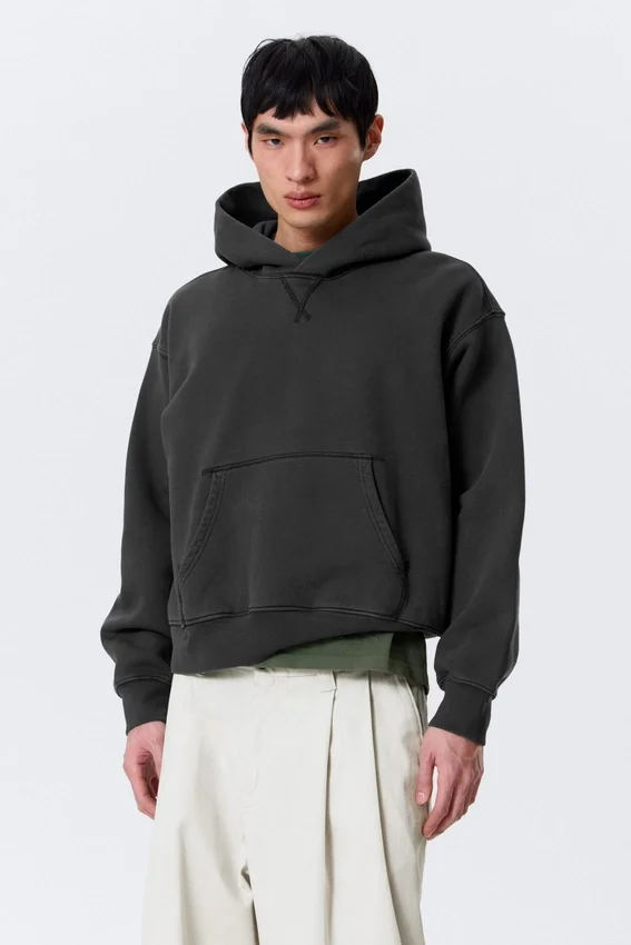 Boxy-Kapuzenpullover aus Baumwollfleece – gewaschenes Schwarz Boxy-Kapuzenpullover aus Baumwollfleece – gewaschenes Schwarz