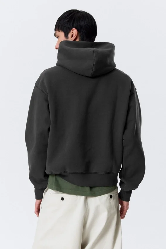 Boxy-Kapuzenpullover aus Baumwollfleece – gewaschenes Schwarz Boxy-Kapuzenpullover aus Baumwollfleece – gewaschenes Schwarz