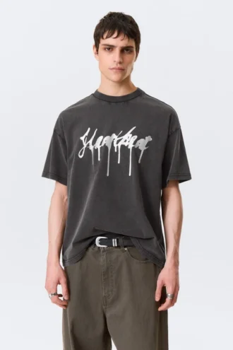 Boxy T-Shirt mit Print – Schwarz – Heartbeat