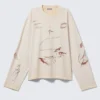 Boxy-Top mit Langarm und Print – Hellbeige – Street-Print Boxy-Top mit Langarm und Print – Hellbeige – Street-Print