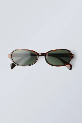 Dünne Sonnenbrille mit ovalem Rahmen – Schildpattmuster