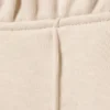 Jogginghose mit mittlerer Leibhöhe, Biesen und ausgestelltem Bein – Hellbeige Jogginghose mit mittlerer Leibhöhe, Biesen und ausgestelltem Bein – Hellbeige