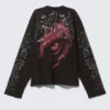 Kastenförmiges bedrucktes Langarmshirt – Washed Black – Dragon Gaze