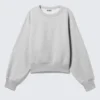 Kastenförmiges, kurz geschnittenes Sweatshirt aus Baumwolle – Grau meliert Kastenförmiges, kurz geschnittenes Sweatshirt aus Baumwolle – Grau meliert