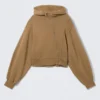 Kurzer, asymmetrischer Kapuzenpullover mit Reißverschluss – gewaschenes Dunkelbeige Kurzer, asymmetrischer Kapuzenpullover mit Reißverschluss – gewaschenes Dunkelbeige
