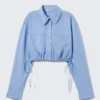 Kurzes, lockeres Cargo-Hemd – Hellblau Kurzes, lockeres Cargo-Hemd – Hellblau