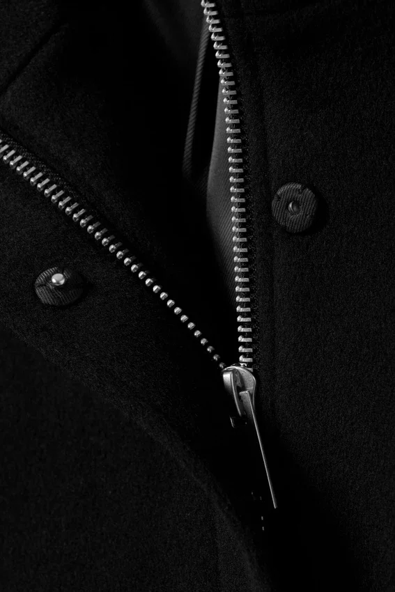 Locker sitzende Wolljacke mit Raglanärmeln – Schwarz Locker sitzende Wolljacke mit Raglanärmeln – Schwarz