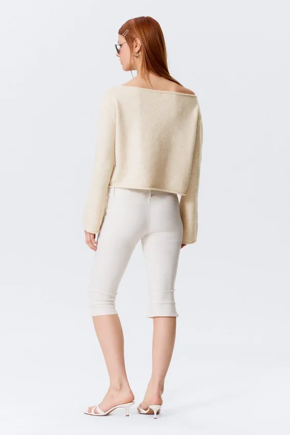 Locker sitzender Pullover mit gerolltem Saum – Hellweiß Locker sitzender Pullover mit gerolltem Saum – Hellweiß