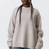 Locker sitzender Strickpullover aus Wolle – Hellbraun meliert