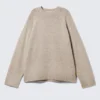 Locker sitzender Strickpullover aus Wolle – Hellbraun meliert