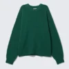 Locker sitzender Strickpullover – Dunkelgrün meliert