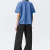 Locker sitzendes, kastenförmiges Baumwoll-T-Shirt – gewaschenes Blau