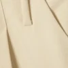 Lockere Dreiviertel-Anzugshorts mit niedriger Leibhöhe – Hellbeige Lockere Dreiviertel-Anzugshorts mit niedriger Leibhöhe – Hellbeige