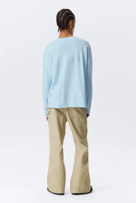 Lockeres langärmeliges Henley-T-Shirt – Hellblau Lockeres langärmeliges Henley-T-Shirt – Hellblau