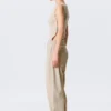 Lose Ballonhose mit niedriger Leibhöhe und Nieten – Beige Lose Ballonhose mit niedriger Leibhöhe und Nieten – Beige