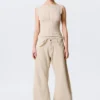 Lose Ballonhose mit niedriger Leibhöhe und Nieten – Beige Lose Ballonhose mit niedriger Leibhöhe und Nieten – Beige
