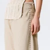 Lose Ballonhose mit niedriger Leibhöhe und Nieten – Beige Lose Ballonhose mit niedriger Leibhöhe und Nieten – Beige
