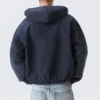Lässige Bomberjacke mit Kapuze – gewaschenes Marineblau Lässige Bomberjacke mit Kapuze – gewaschenes Marineblau