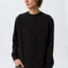 Lässiges Langarmshirt – Schwarz