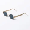 Minimalistische ovale Sonnenbrille aus Metall – Goldfarben – Dunkelblaue Gläser Minimalistische ovale Sonnenbrille aus Metall – Goldfarben – Dunkelblaue Gläser