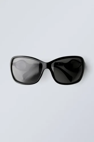 Ovale Sonnenbrille mit Metalldetails – Schwarz