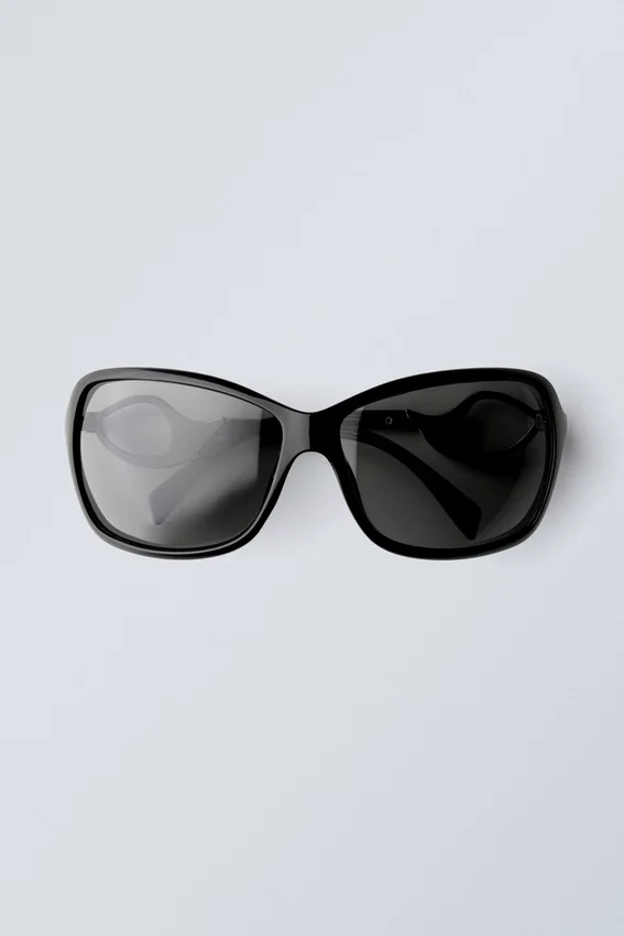 Ovale Sonnenbrille mit Metalldetails – Schwarz Ovale Sonnenbrille mit Metalldetails – Schwarz