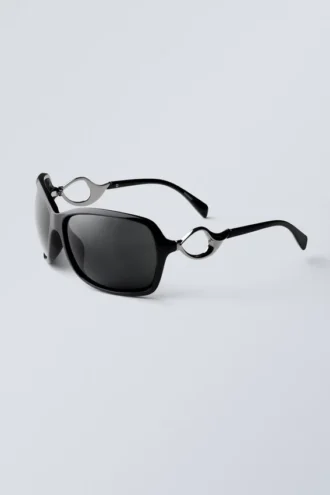 Ovale Sonnenbrille mit Metalldetails – Schwarz