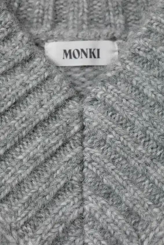 Oversize-Strickpullover mit V-Ausschnitt – Grau meliert Oversize-Strickpullover mit V-Ausschnitt – Grau meliert