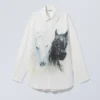 Oversized-Hemd aus bedrucktem Popeline – weiße und schwarze Pferde