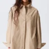 Oversized-Langarm-Hemd – gestreift, beige