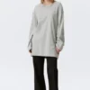 Oversized-T-Shirt-Kleid mit langen Ärmeln – Grau meliert Oversized-T-Shirt-Kleid mit langen Ärmeln – Grau meliert