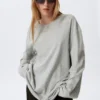 Oversized-T-Shirt-Kleid mit langen Ärmeln – Grau meliert Oversized-T-Shirt-Kleid mit langen Ärmeln – Grau meliert