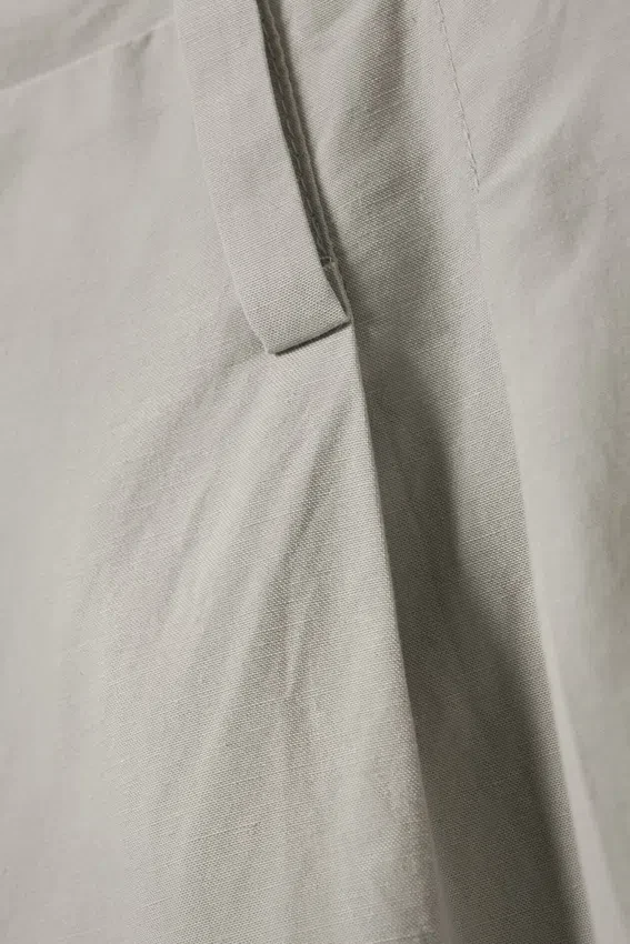 Plissee-Hose mit niedriger Leibhöhe und weitem Bein – Hellbraun Plissee-Hose mit niedriger Leibhöhe und weitem Bein – Hellbraun