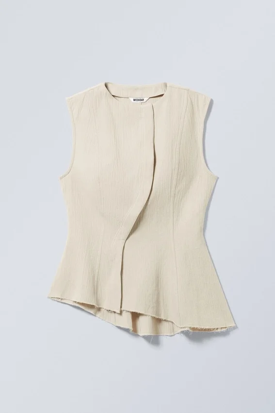 Ärmelloses, asymmetrisches Peplum-Top – Ecru Ärmelloses, asymmetrisches Peplum-Top – Ecru