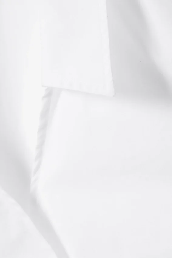 Ärmelloses Wickeloberteil aus Baumwolle – Weiß Ärmelloses Wickeloberteil aus Baumwolle – Weiß