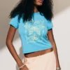 Rosabel Baby-T-Shirt mit Aufdruck – Türkis – Schmetterling
