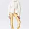 Stretch-Hose mit niedriger Leibhöhe und ausgestelltem Bein – Hellgelb – Blumenmuster