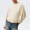 Strickpullover mit Volants am Saum – Off-White