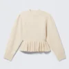 Strickpullover mit Volants am Saum – Off-White