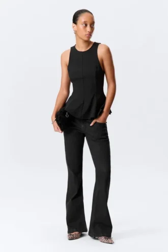 Tailliertes Nylon-Peplum-Top – Schwarz
