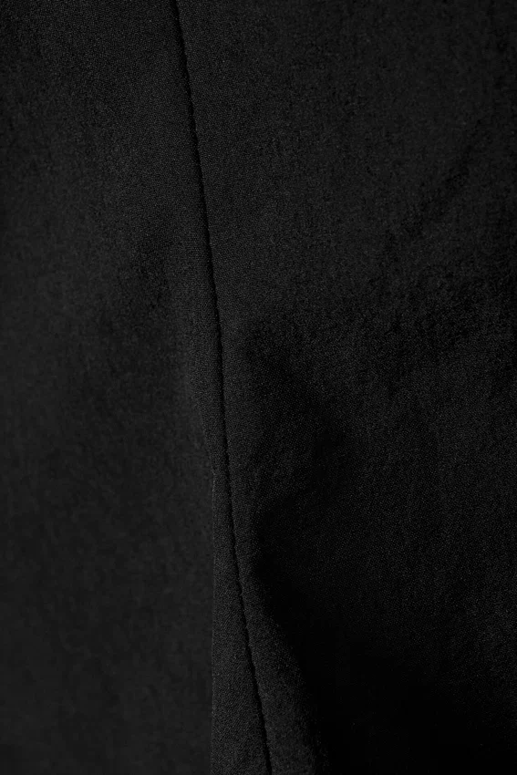 Tailliertes Nylon-Peplum-Top – Schwarz Tailliertes Nylon-Peplum-Top – Schwarz