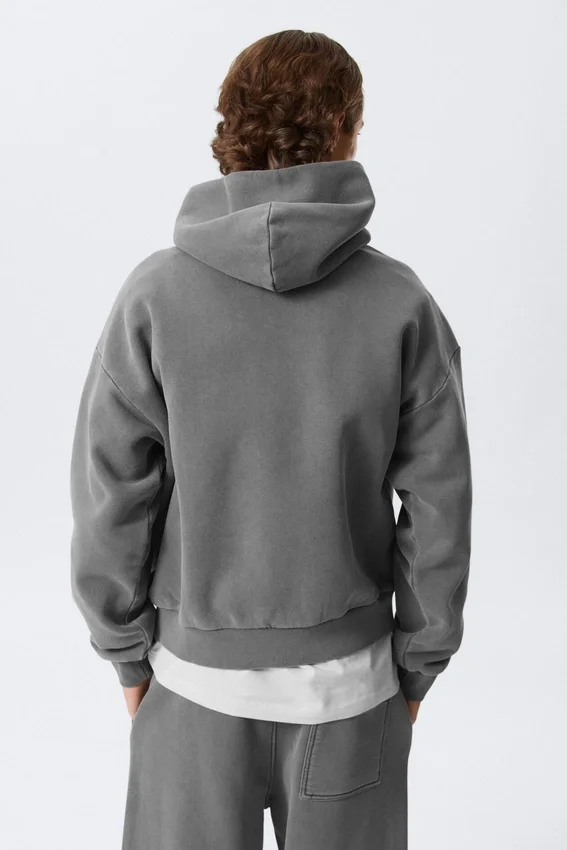 Weit geschnittener Kapuzenpullover aus schwerer Baumwolle – gewaschen, dunkelgrau Weit geschnittener Kapuzenpullover aus schwerer Baumwolle – gewaschen, dunkelgrau