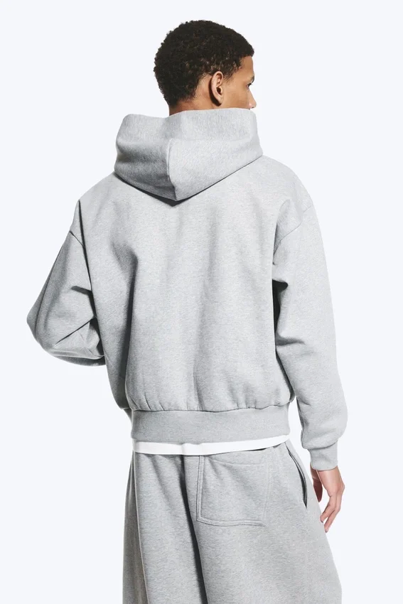Weit geschnittener Kapuzenpullover mit Reißverschluss – Grau meliert Weit geschnittener Kapuzenpullover mit Reißverschluss – Grau meliert