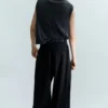 Weite Hose mit Falten und weitem Bein – Schwarz Weite Hose mit Falten und weitem Bein – Schwarz